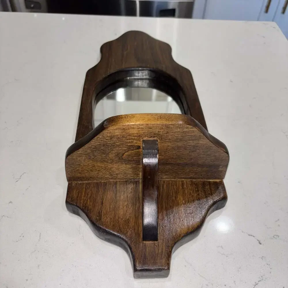 Vintage Wall-Mounted Dark Wood Sconce with Oval Mirror and Shelf
